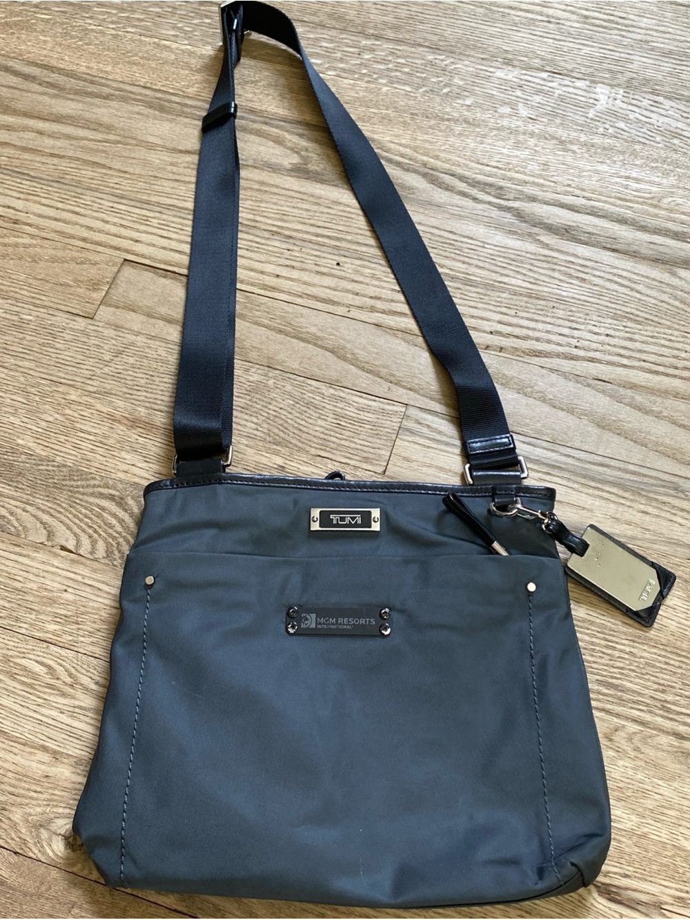 Tumi Black Nylon Crossbody Bag with Adjustable Shoulder Strap Branded Logo